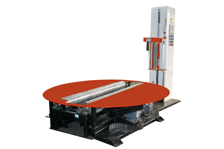 Reel wrapping machine