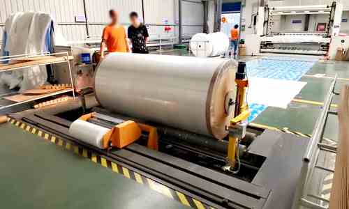 Application and Advantages of Cylinder Stretch Wrapping Machines in Nonwoven Fabric Roll Packaging