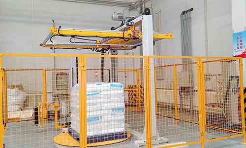 Application of Pallet Stretch Wrapping Machines with Top Sheet Coverage in Warehouse Protection Packaging